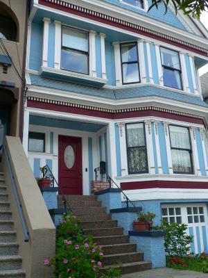 Exterior of house painted blue.